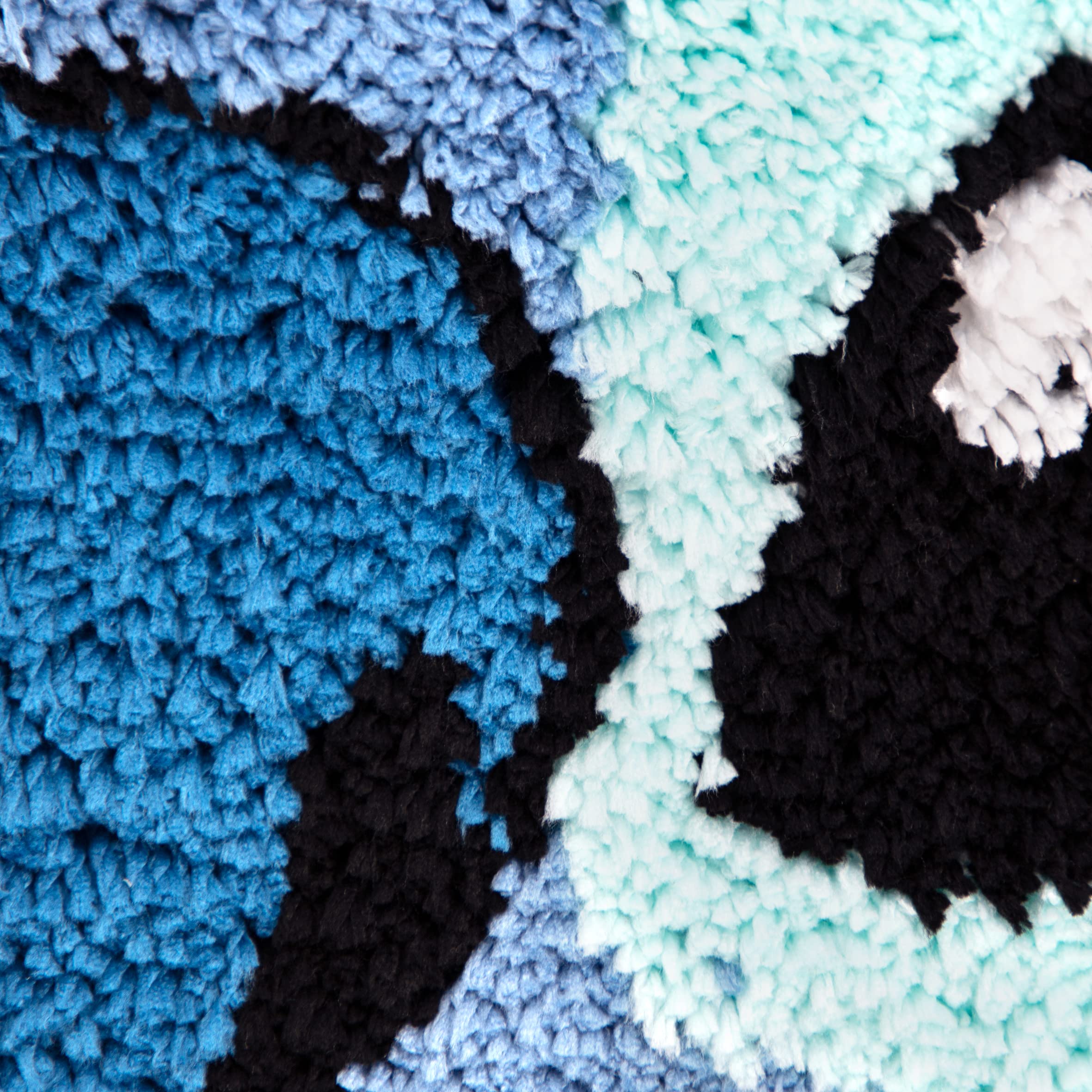 Jay Franco tapis Lilo & Stitch détail des fibres tuftées pour résistance et toucher moelleux