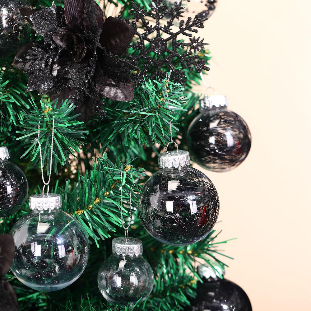 Jenaai décor complet sur sapin, ambiance noire élégante