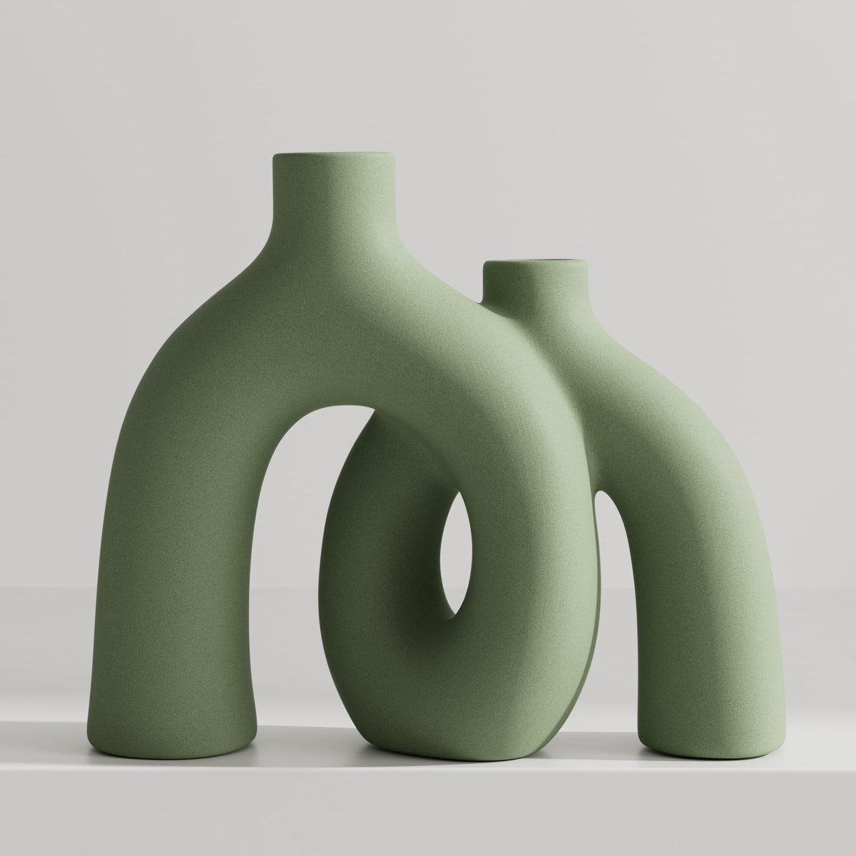 Jonronboci vue avant du vase Hug Donut vert sauge, accent décoratif élégant