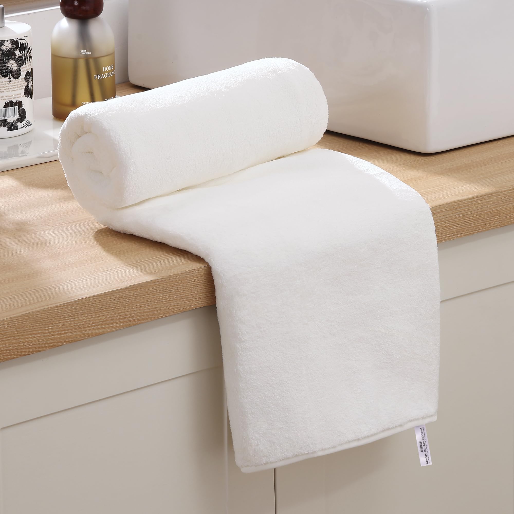 JOYMOOP gros plan sur les fibres microfibre montrant absorption rapide