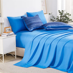KAKIJUMN drap plat et drap housse présentés pour montrer couleurs et ajustement