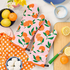 kate spade new york dos du gant montrant le tissu imprimé et la boucle d’accrochage