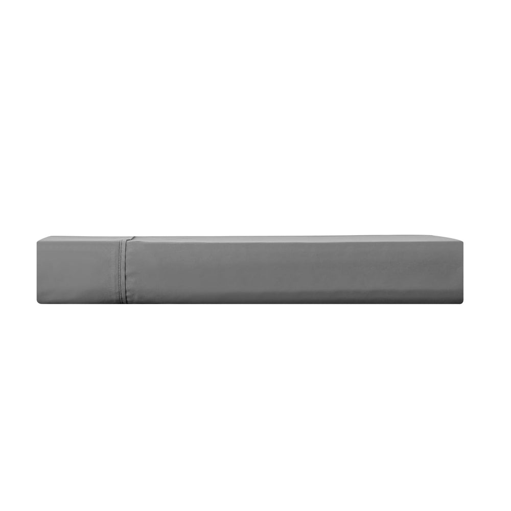 Kingnex drap en usage sur lit king démontrant couverture complète