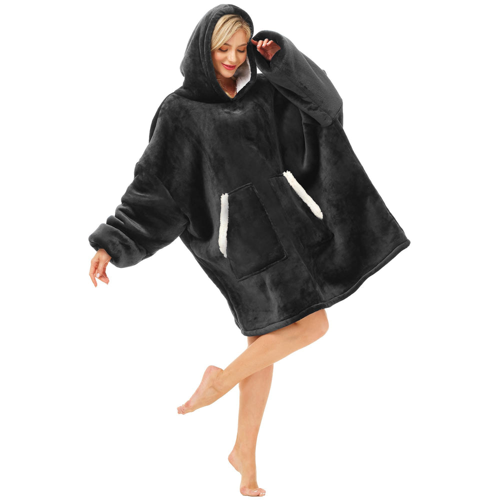 Kipswiza devant du hoodie noir montrant coupe oversize et confort
