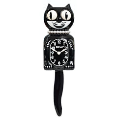 Kit Cat Klock vue avant noir brillant ajoute caractère décoratif