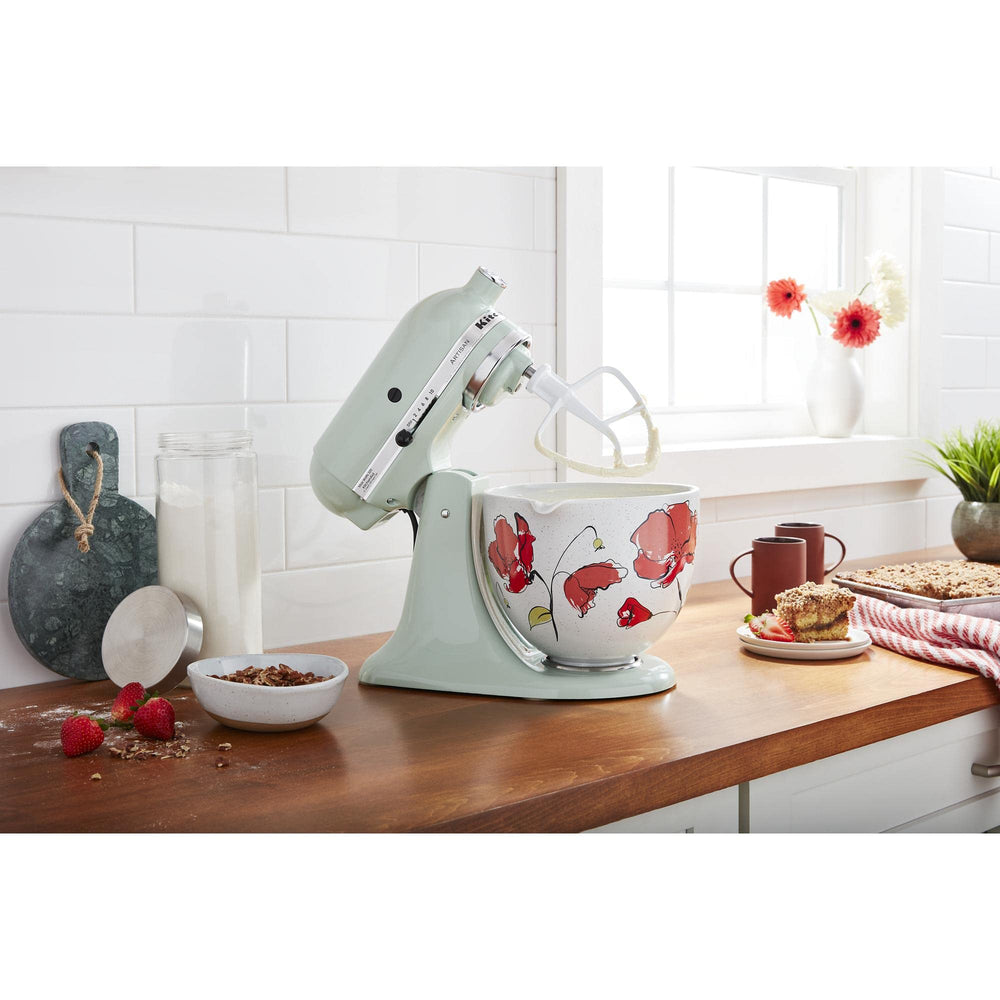 KitchenAid bol Poppy présenté en table avec préparation, apporte couleur et service pratique