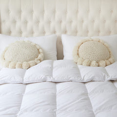kitletsuit pompons faits main gros plan accent artisanal et charme