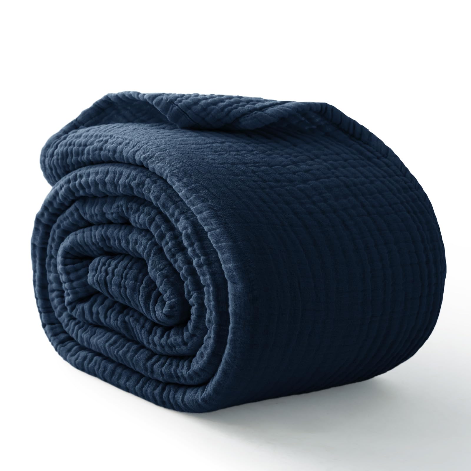 Kozyhvn couverture pliée bleu marine montrant élégance et rangement facile