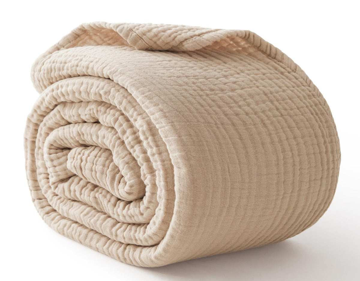 Kozyhvn couverture pliée présentant l'esthétique beige et confort visuel