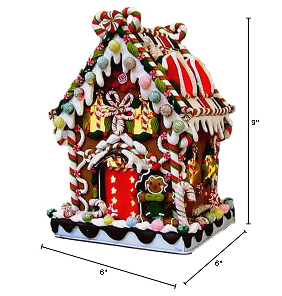 Kurt S. Adler maison posée sur nappe festive créant ambiance cosy