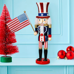 Kurt S. Adler Uncle Sam tenant un drapeau américain, accent patriotique pour décoration festive