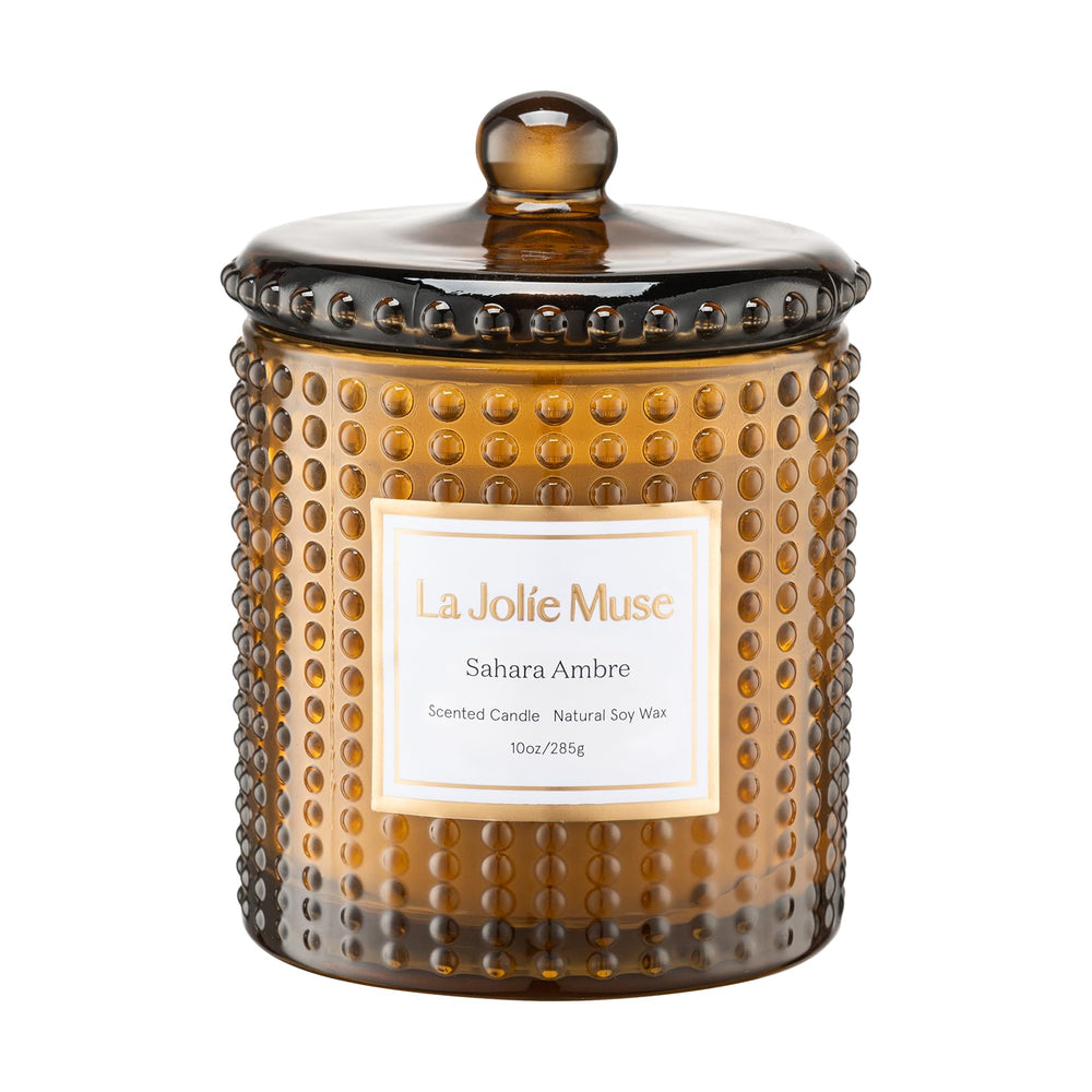 LA JOLIE MUSE bougie Sahara Amber vue de face avec flamme et ambiance