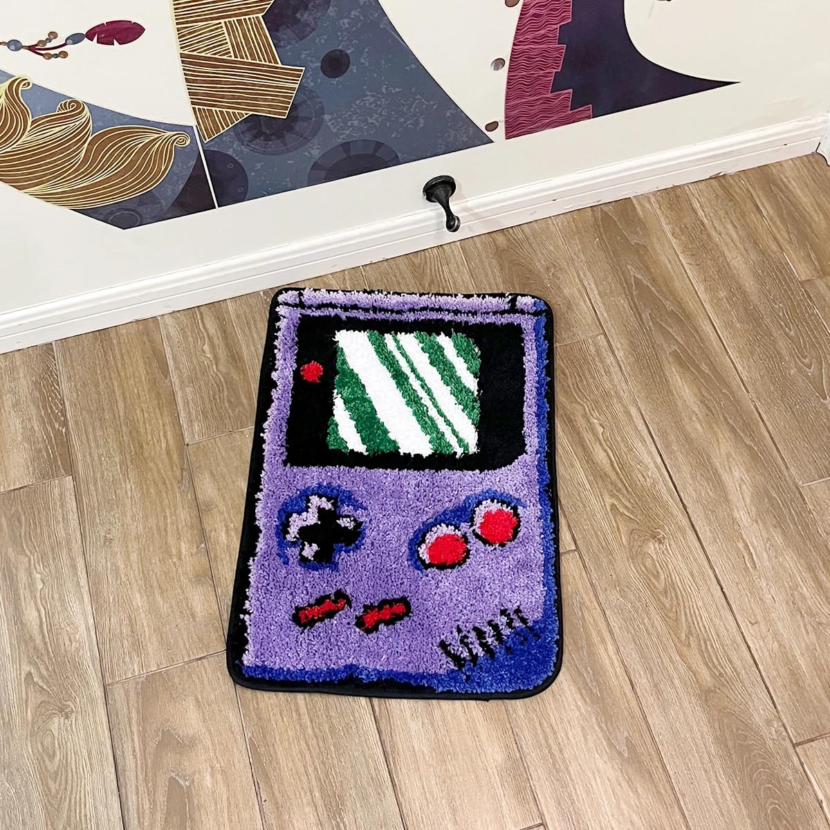 LAKEA tapis à l'échelle posé à côté d'une chaussure pour dimension