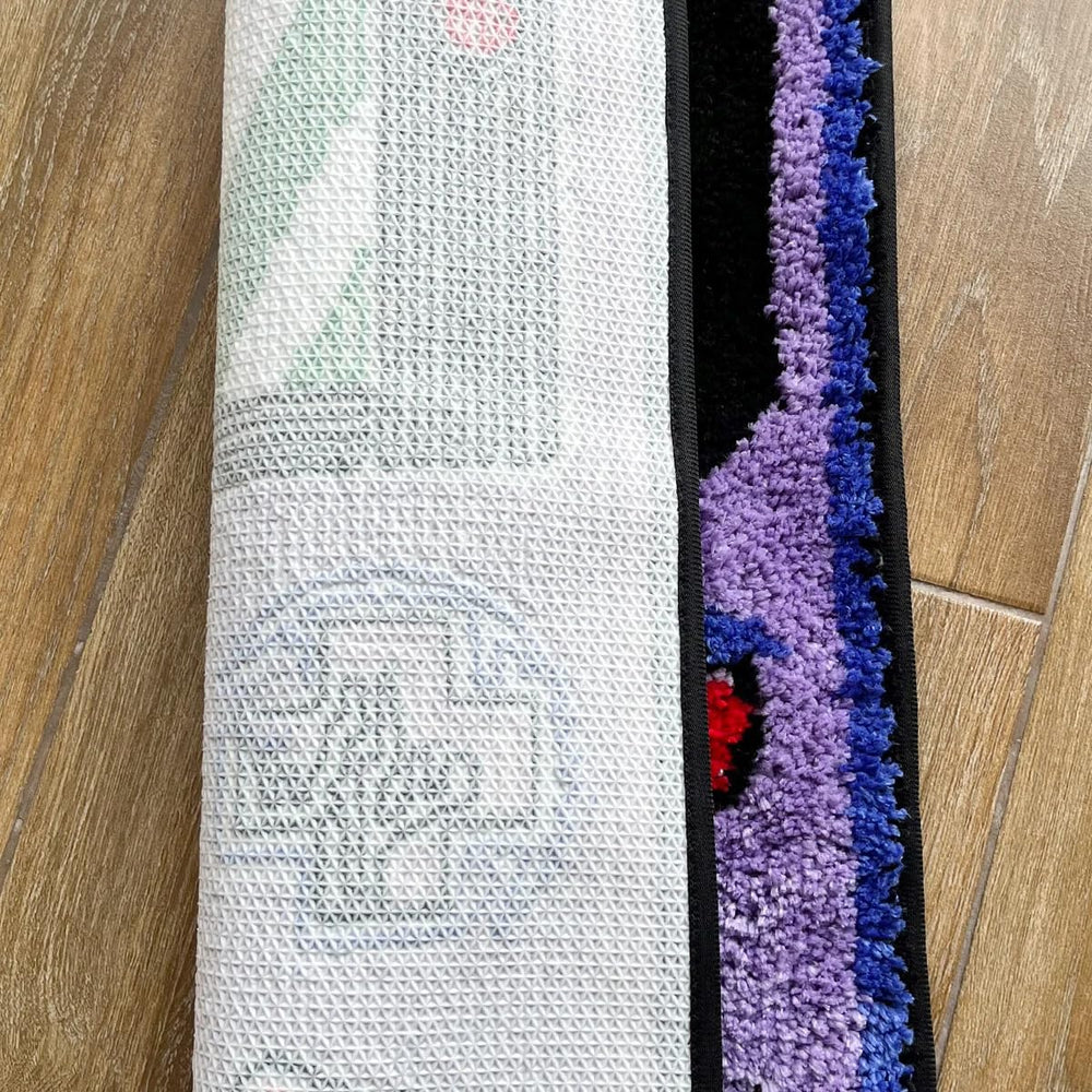LAKEA tapis posé près d'un bureau gaming pour personnaliser l'espace