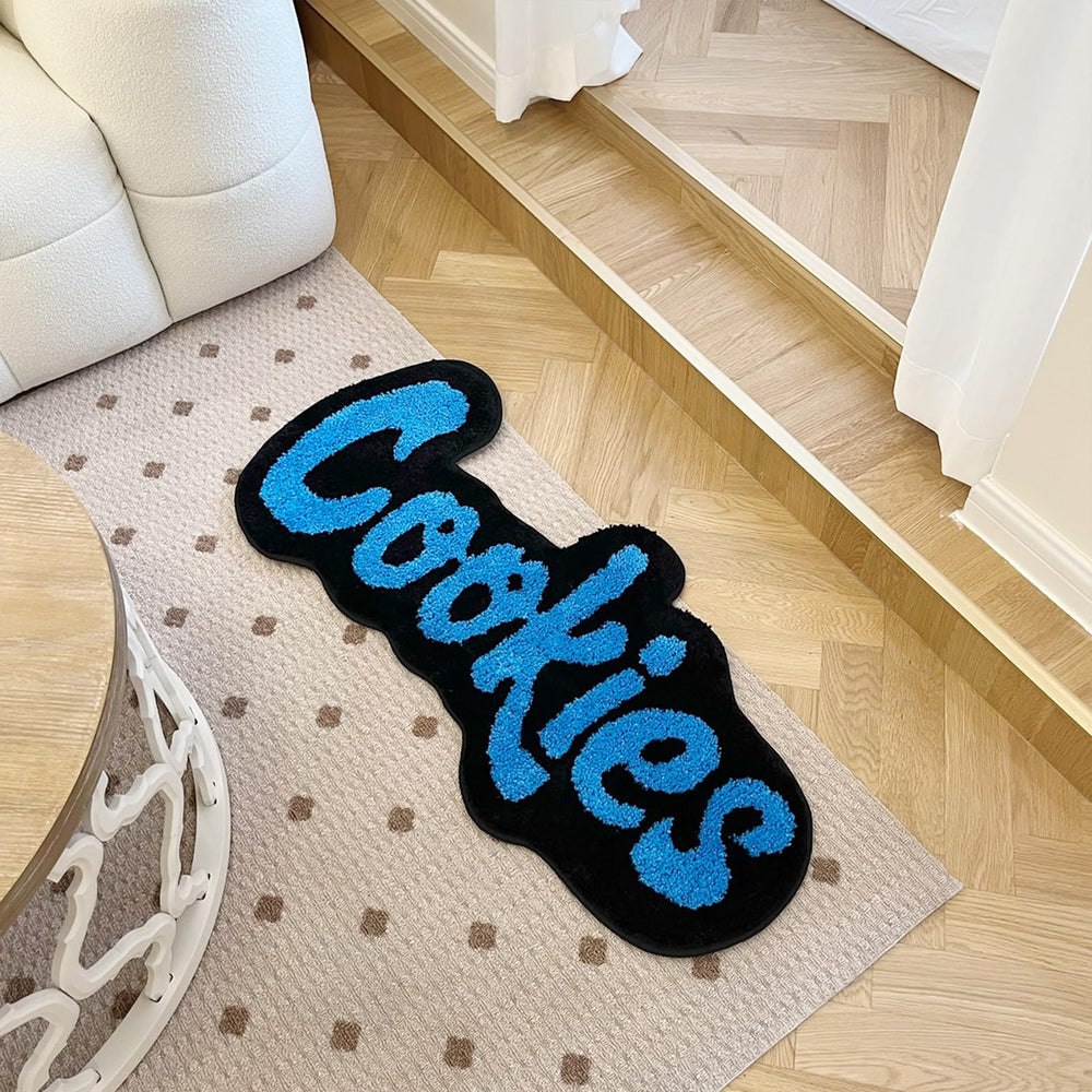 LAKEA tapis posé devant un lit ajoutant chaleur à la chambre