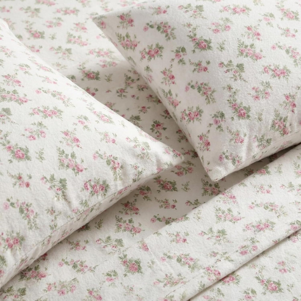 Laura Ashley lit fait avec les draps Audrey Pink illustrant confort et style