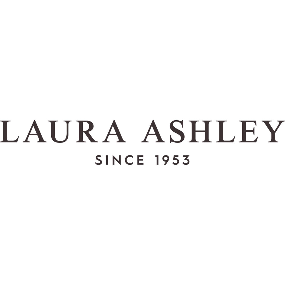 Laura Ashley draps pliés pour rangement conservant douceur et gain de place