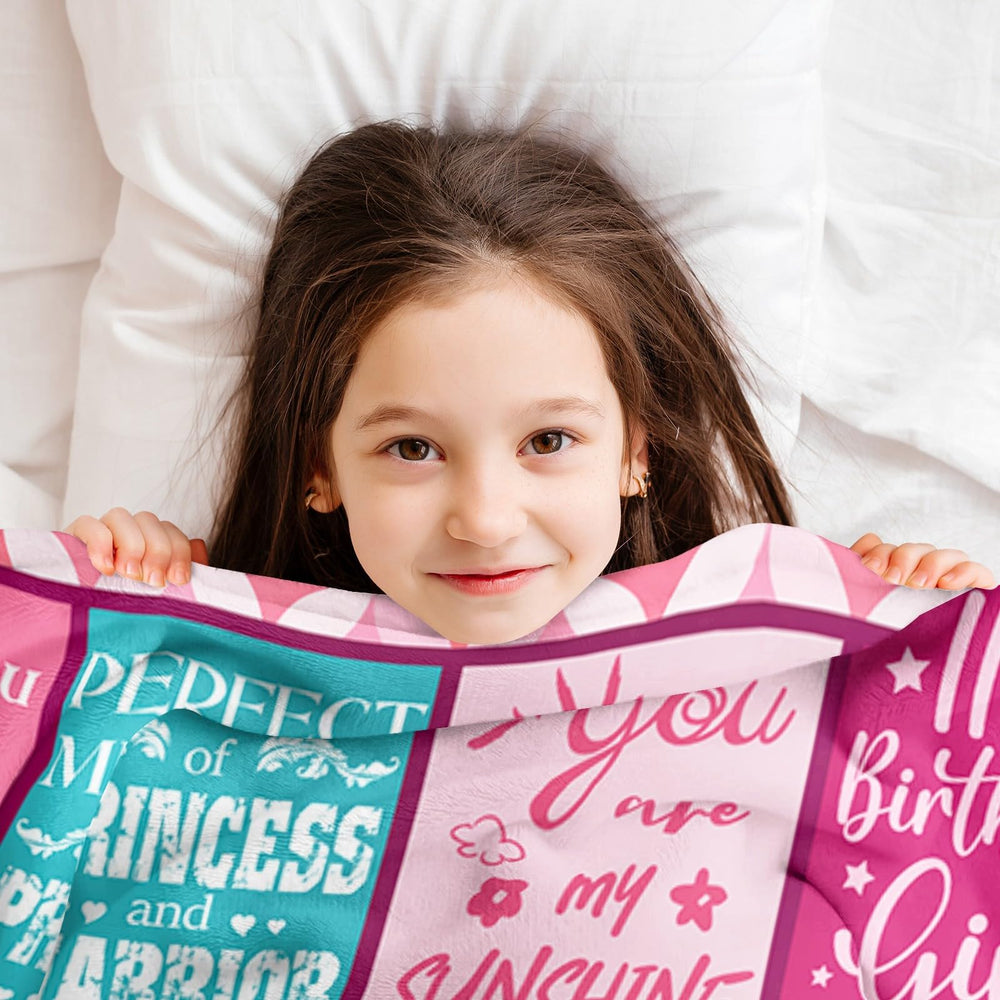 Lavua couverture posée sur un lit enfant apportant une touche déco chaleureuse