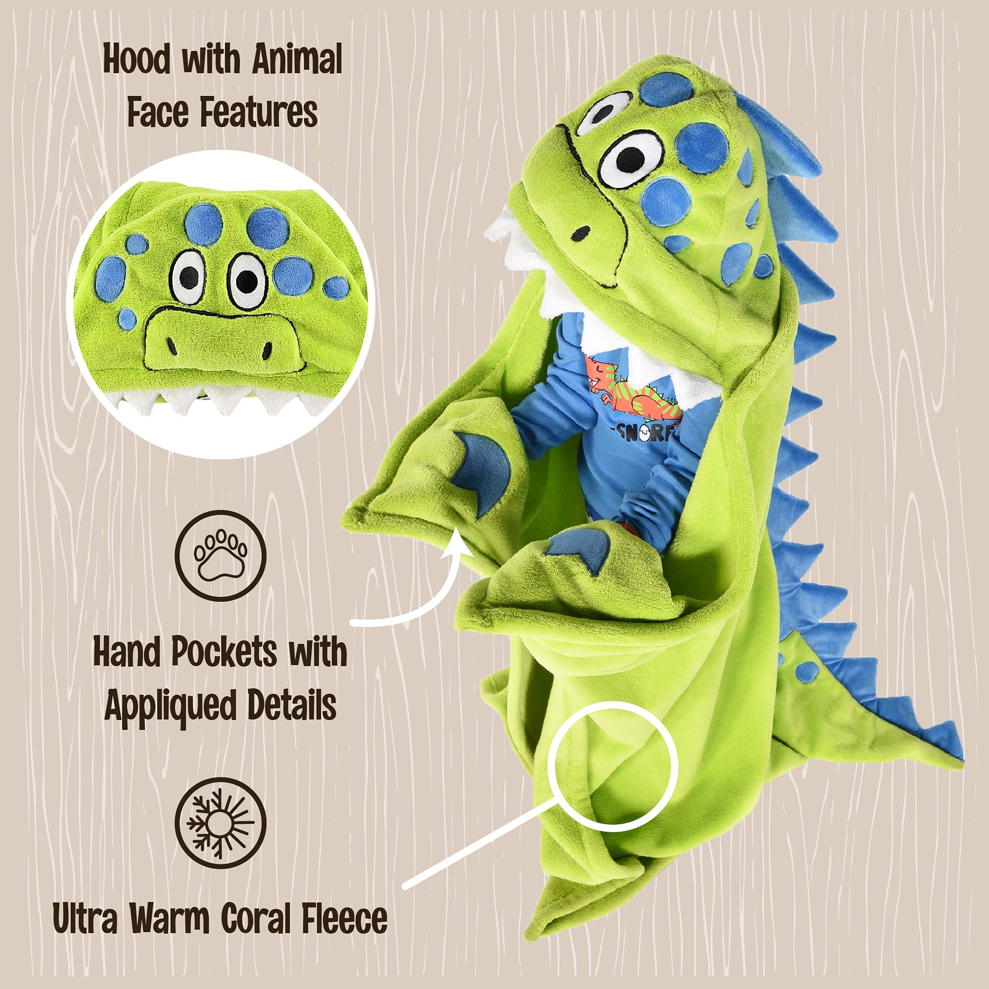 Lazy One enfant portant le plaid dinosaure, montre aisance de mouvement et sourire
