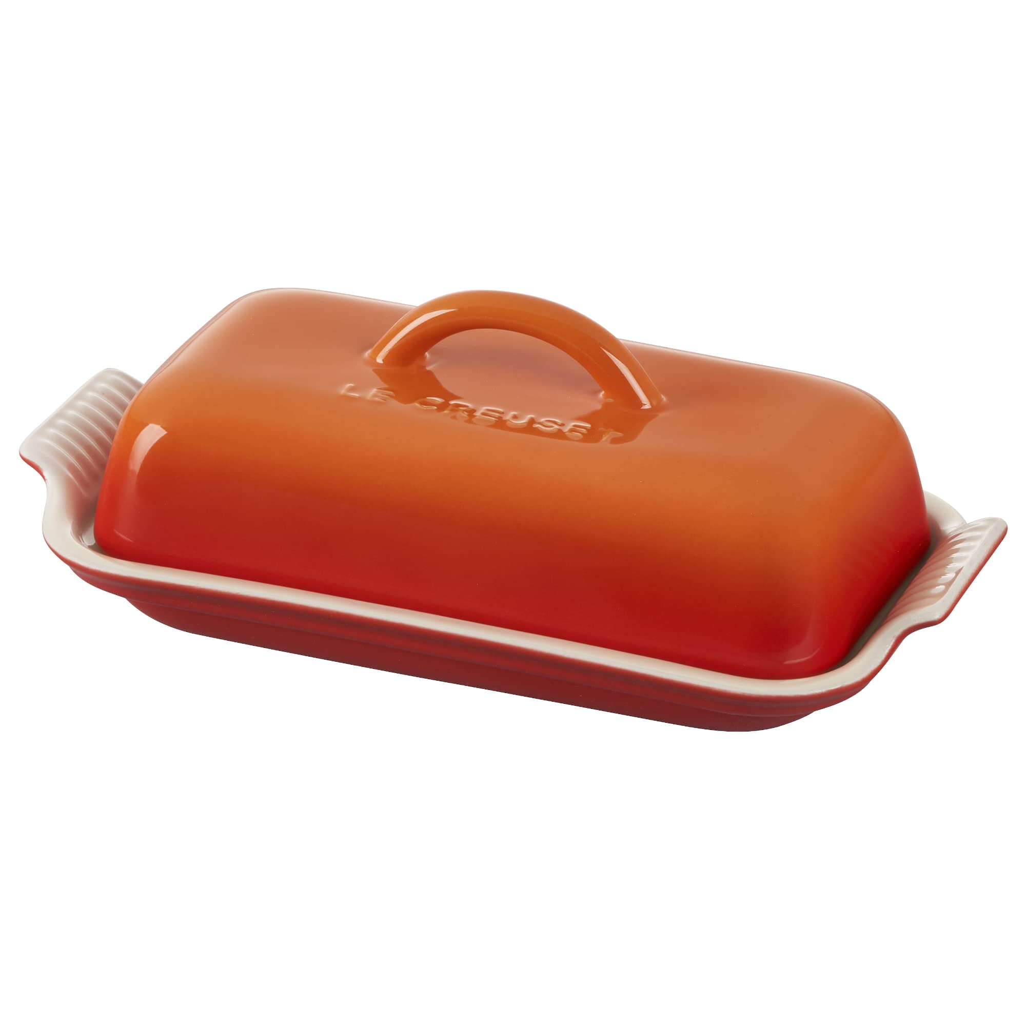 Le Creuset beurrier Heritage face avant montrant la couleur Flame et présentation élégante