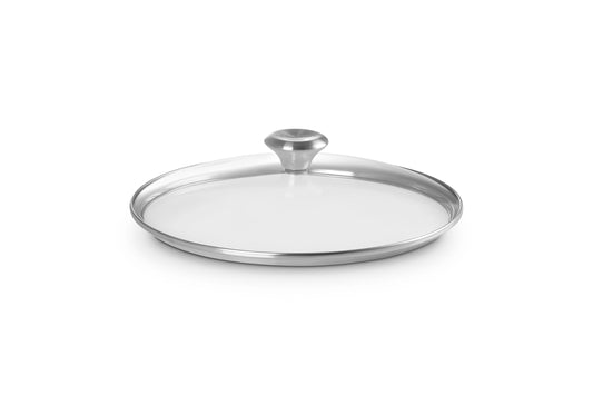 Le Creuset couvercle en verre posé sur poêle montrant ajustement précis
