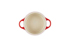 Le Creuset motif embossé d'arbres sur le couvercle soulignant le design