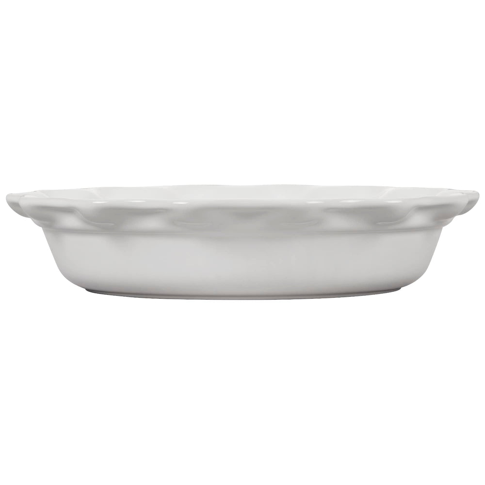 Le Creuset moule Heritage à l'échelle avec main pour taille et ergonomie