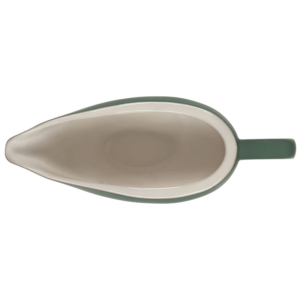Le Creuset saucière Heritage en usage sur une table, garde la sauce chaude