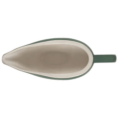 Le Creuset saucière Heritage en usage sur une table, garde la sauce chaude