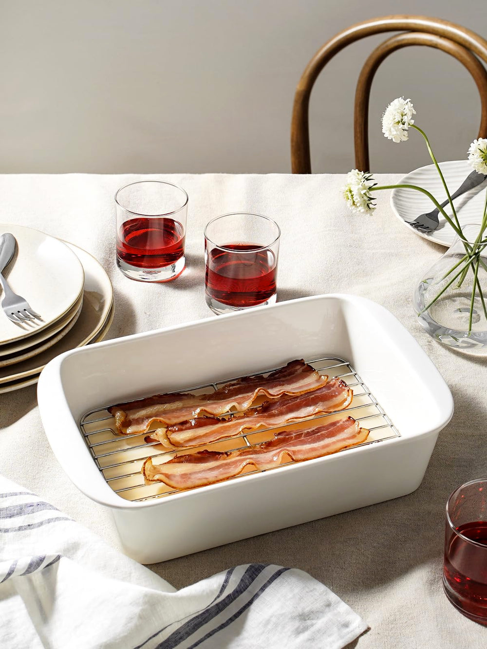 LE TAUCI rack placé sous un poulet rôti pour réduire graisses et améliorer texture