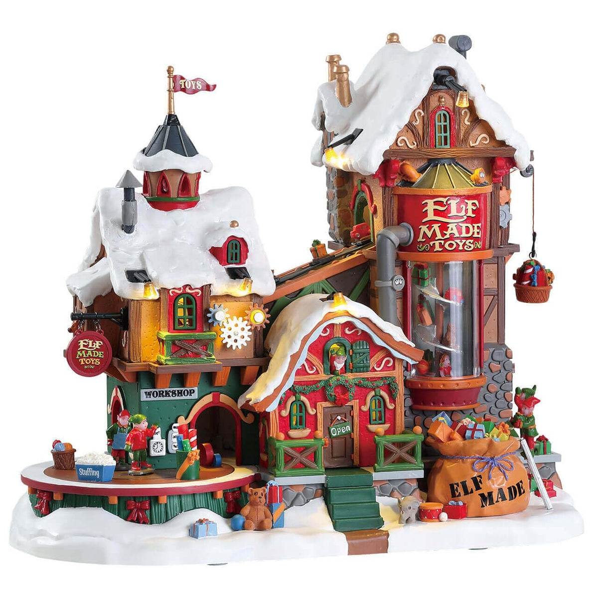 Lemax usine de jouets façade avant éclairée montrant détails architecturaux et ambiance