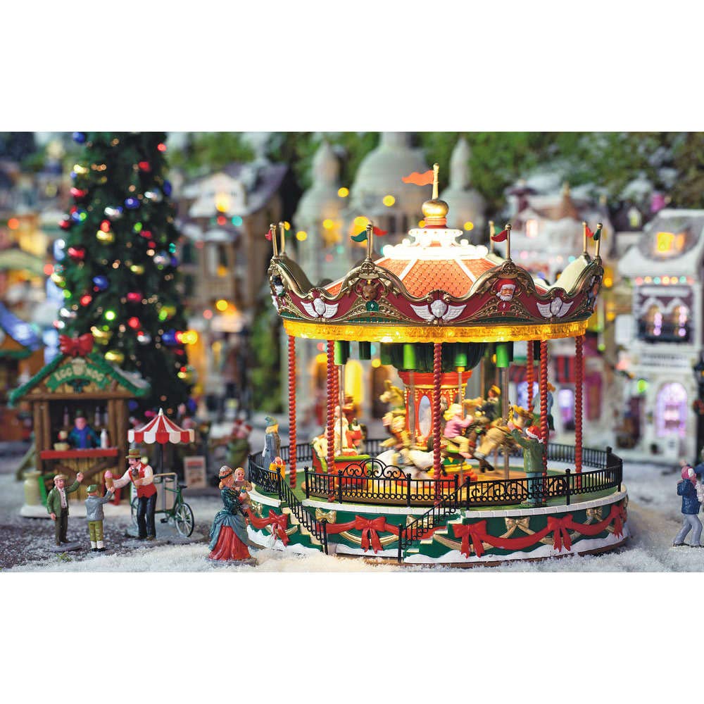 Lemax Santa Carousel en fonctionnement avec lumières et sons pour ambiance