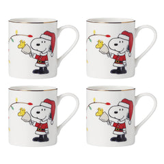 Lenox mug Snoopy ensemble de quatre montrant la face et la décoration festive pour partager
