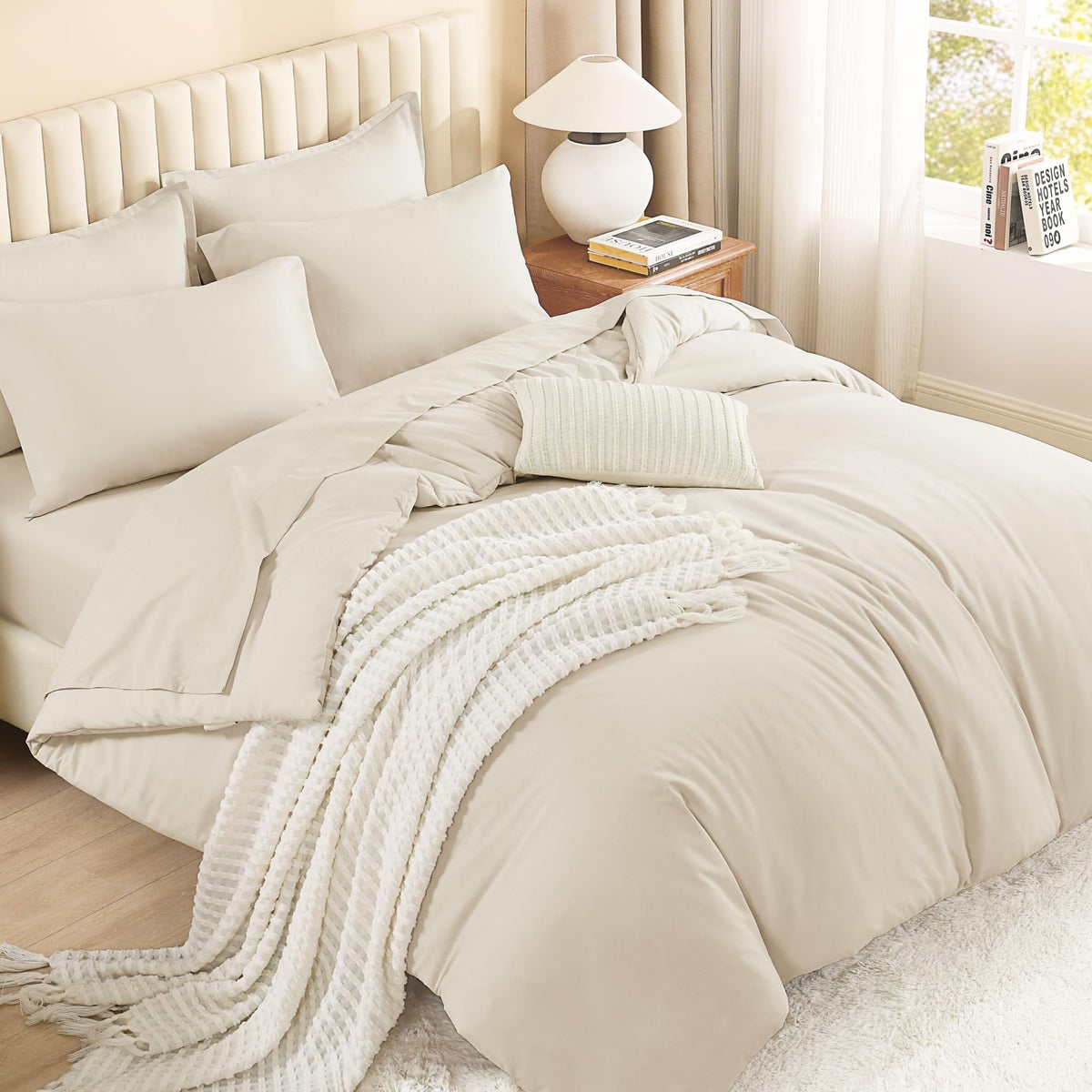 Litanika couette recto beige posée sur lit king montrant finition soignée