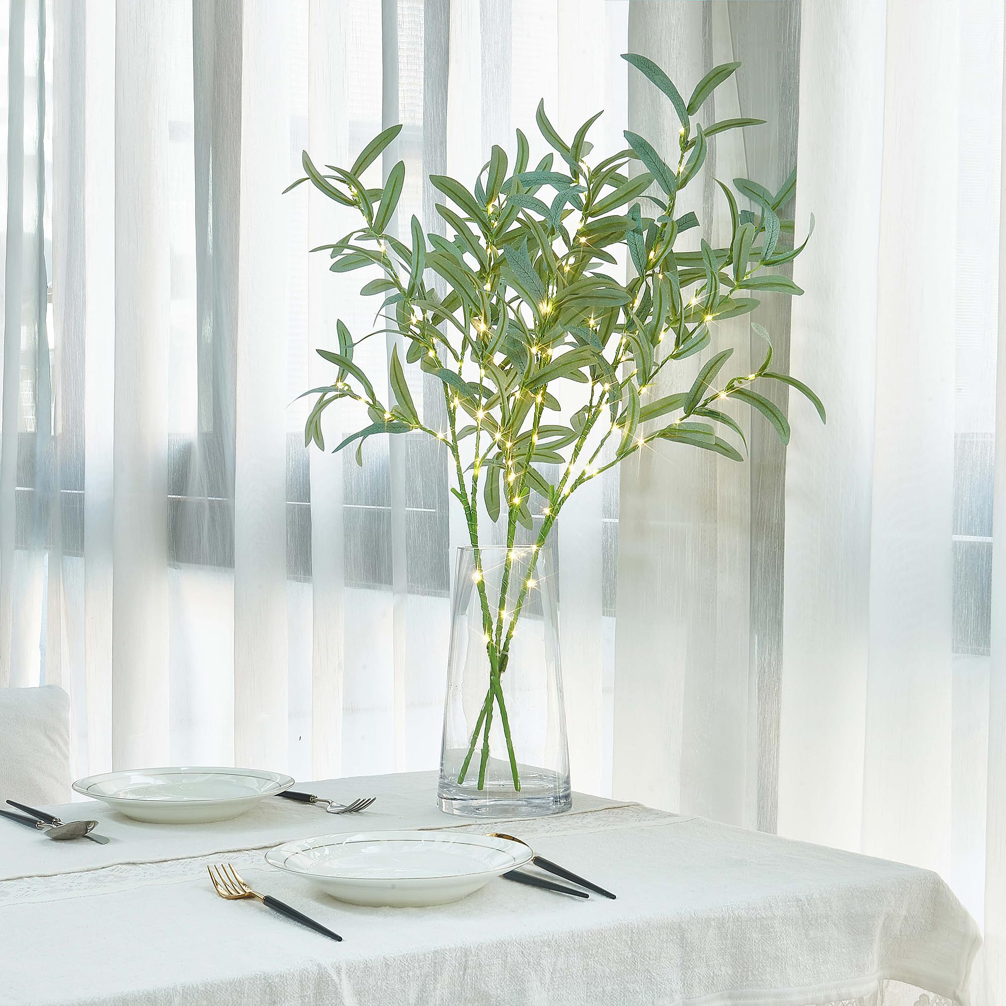 LITBLOOM branche tenue à la main pour montrer l'échelle et la flexibilité