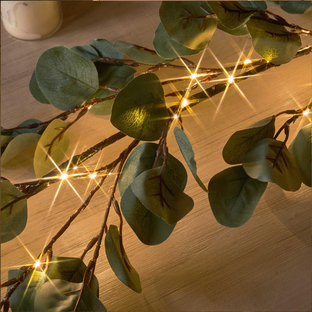 LITBLOOM guirlande posée sur manteau créant ambiance chaleureuse instantanée