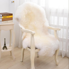 LLB tapis posé sur fauteuil, confort immédiat et aspect décoratif