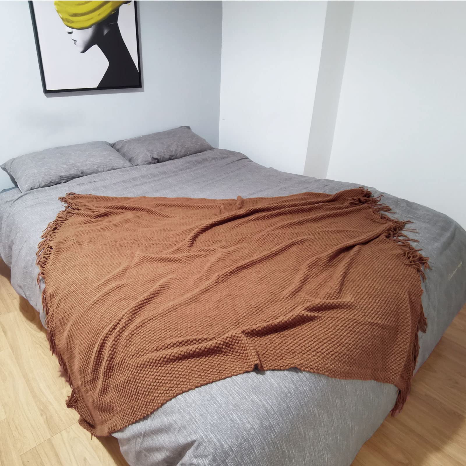 LOMAO plaid porté sur les épaules en extérieur illustrant confort léger et mobilité