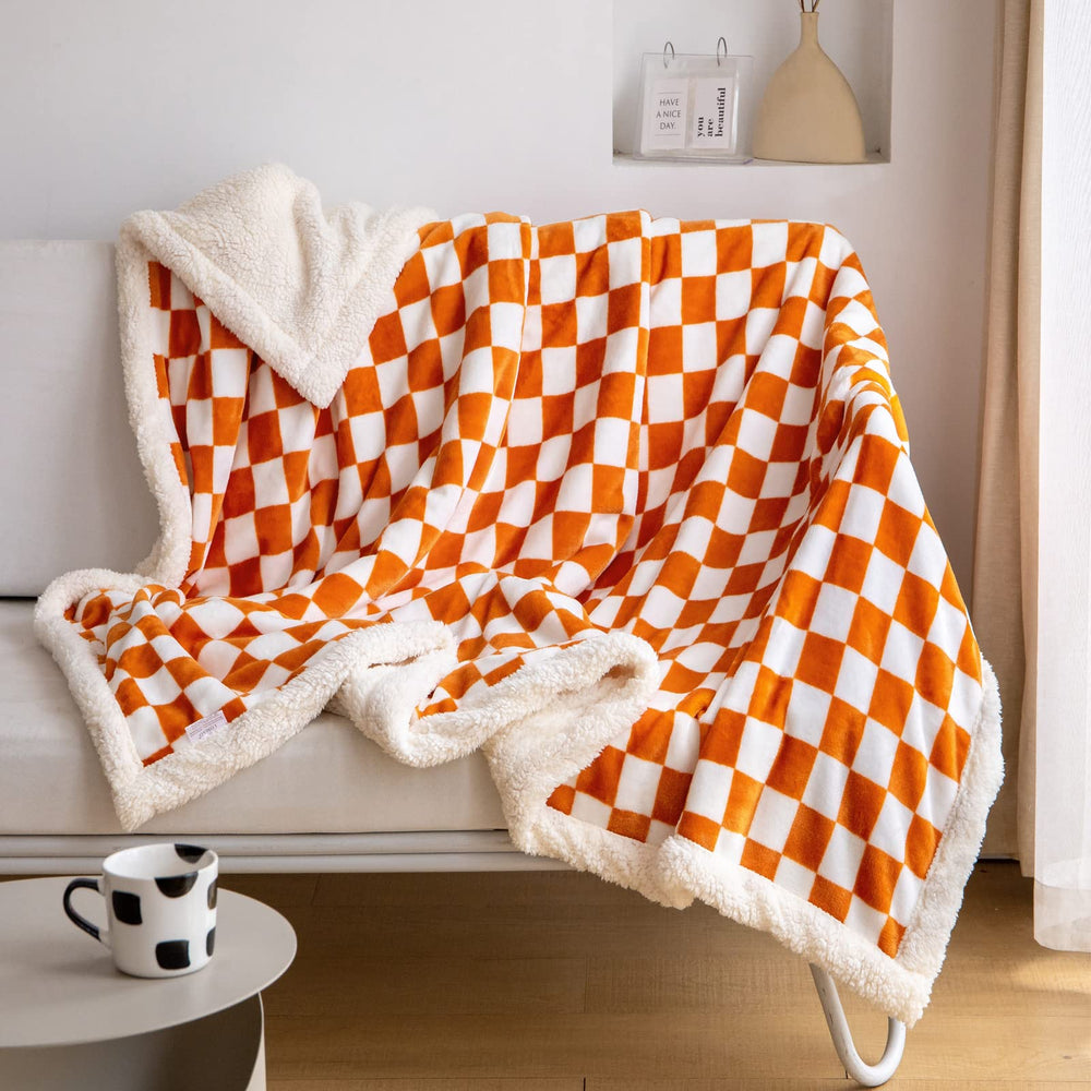 LOMAO plaid Sherpa sur canapé apportant chaleur et style