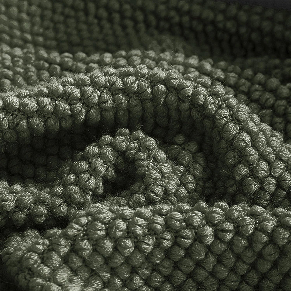 LOMAO plaid posé sur canapé apportant confort visuel immédiat