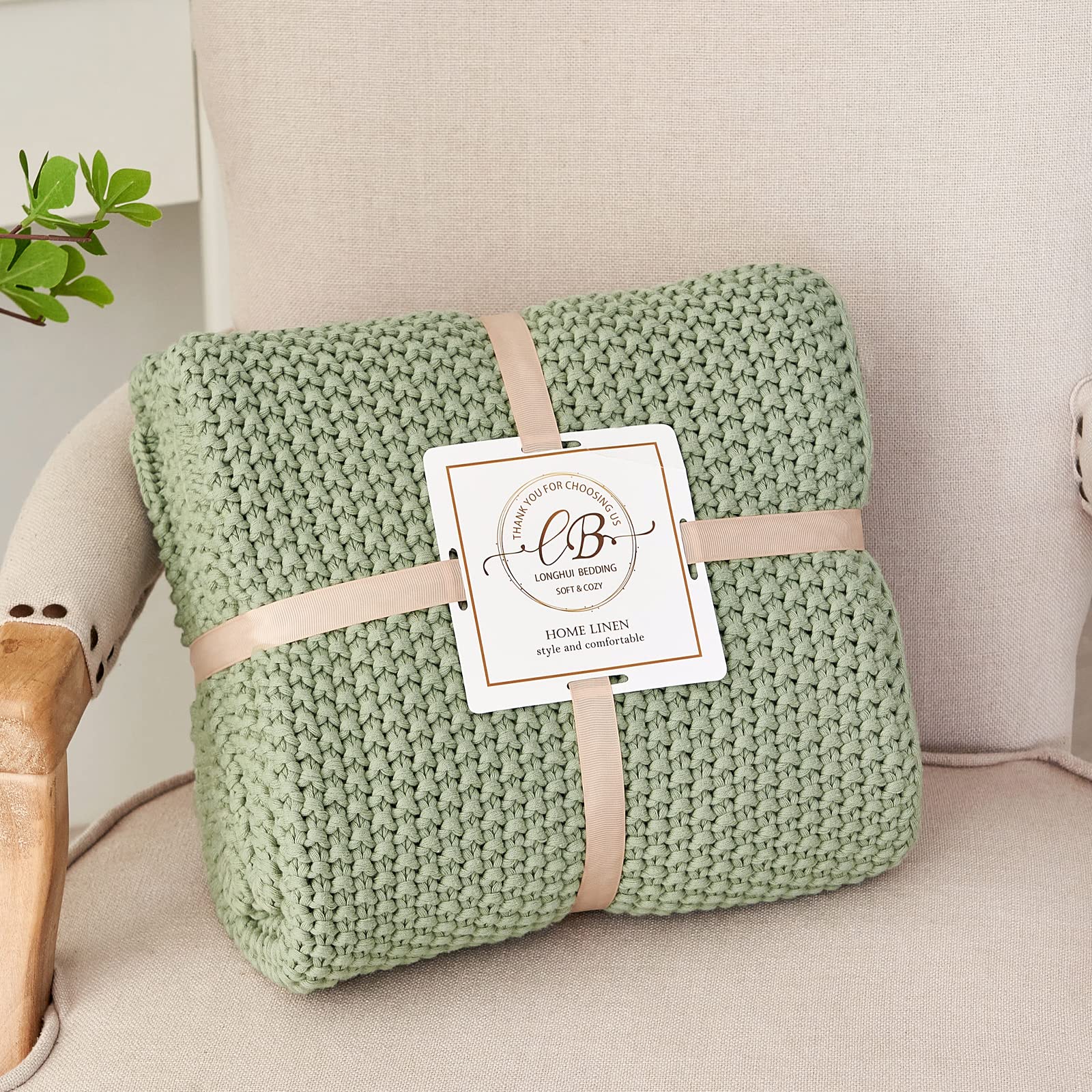 Longhui bedding plié et attaché d’un ruban, prêt à offrir en cadeau