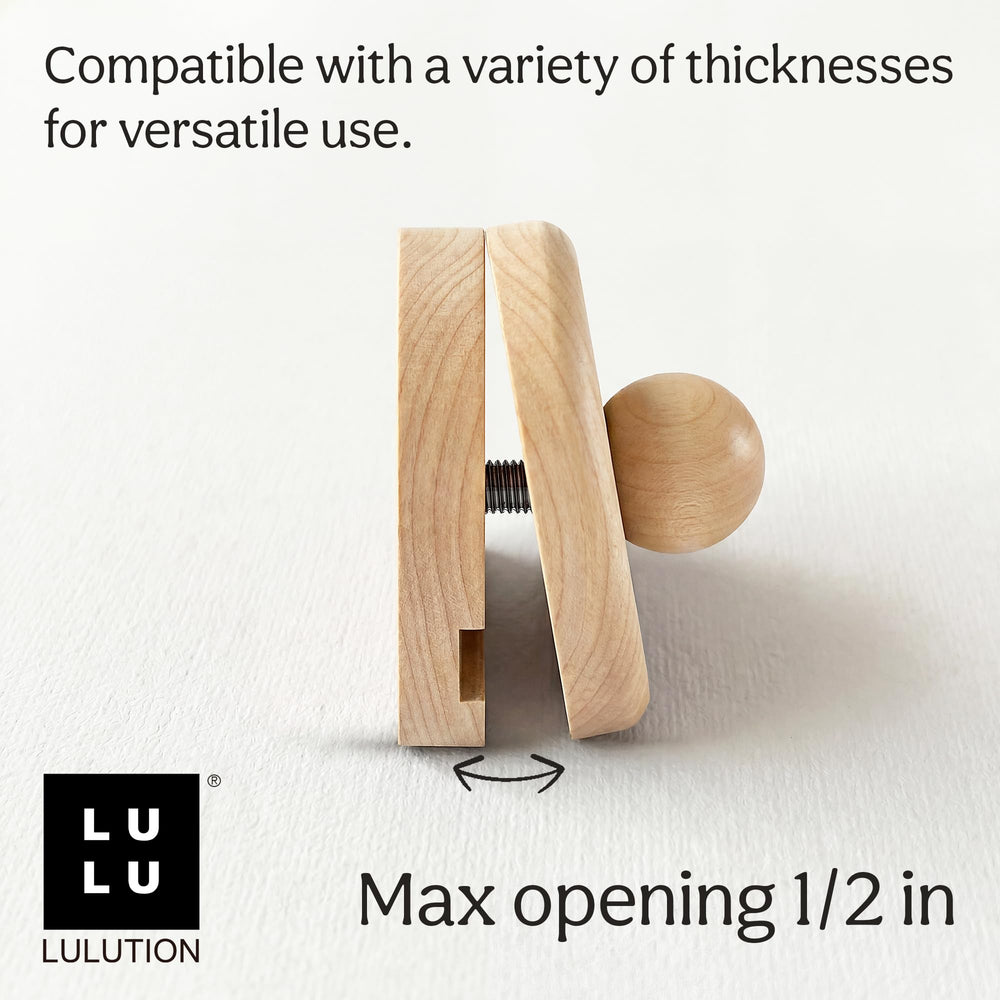 LULUTION comparaison taille main, montre la large zone de serrage