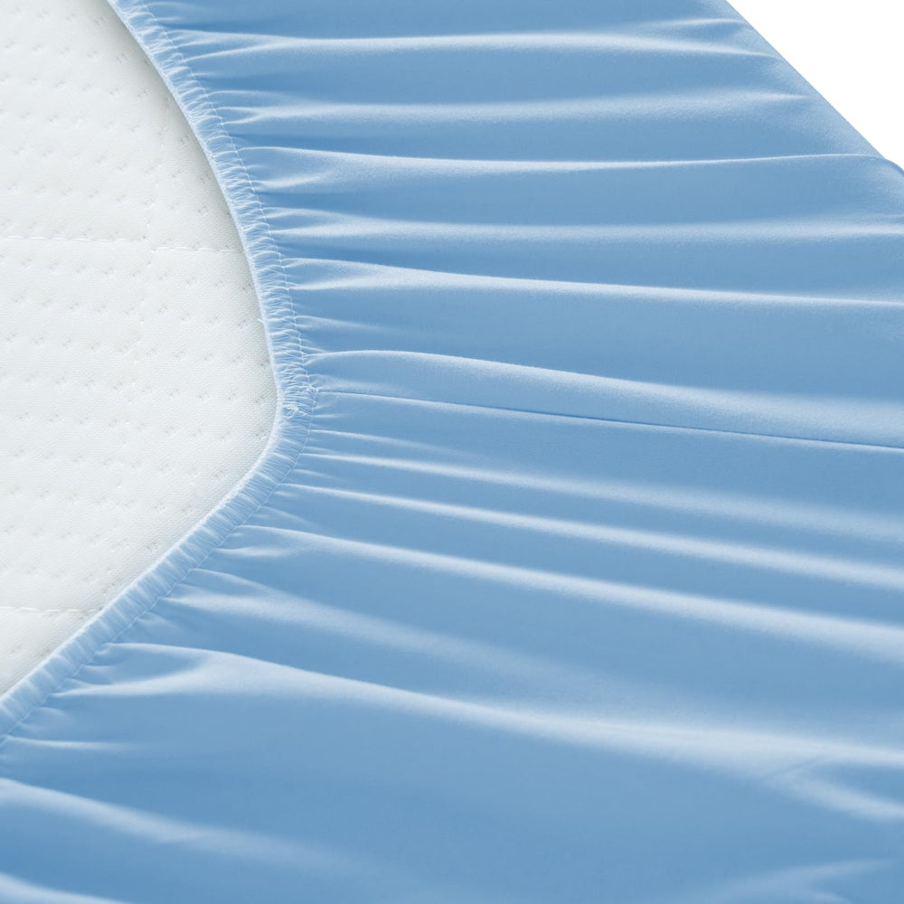 Luv4babe draps installés sur lit médicalisé montrant maintien lors du réglage