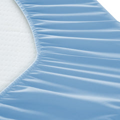 Luv4babe draps installés sur lit médicalisé montrant maintien lors du réglage