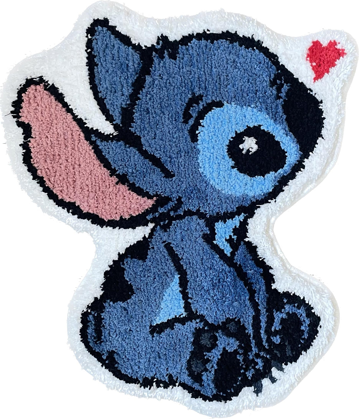 Luxape Stitch Rug face avant montrant motif animé et apport décoratif