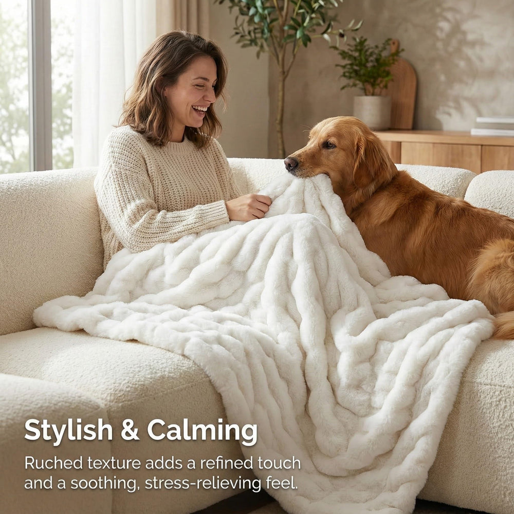 Luxury Concepts jeté posé sur lit créant une ambiance cosy