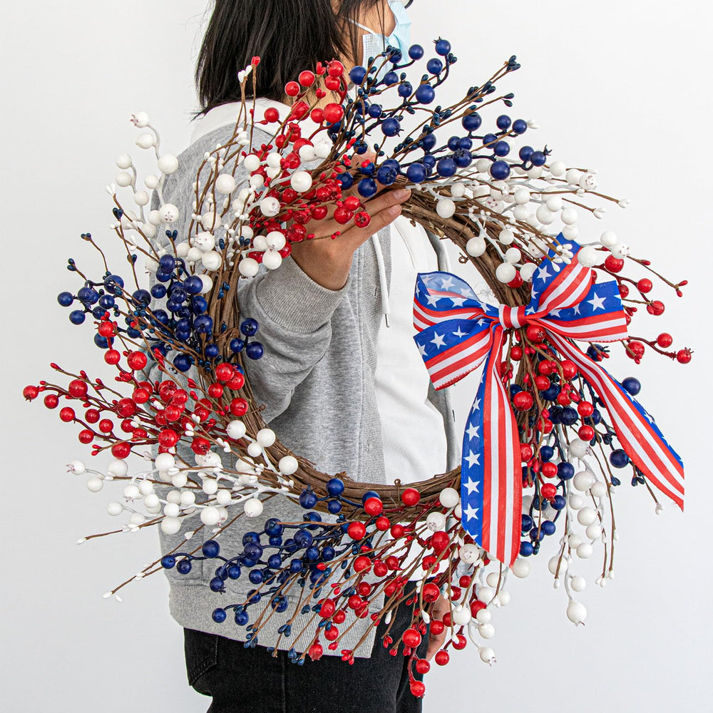 MagicWreath couronne suspendue sur une porte montrant impact visuel extérieur