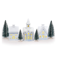 Mark Feldstein vue d'ensemble du village blanc prêt à décorer et créer une ambiance chaleureuse