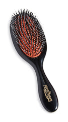 Mason Pearson vue avant de la brosse compacte montrant la poignée et le coussin, pratique pour le voyage