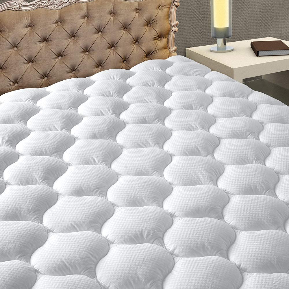 MATBEBY vue de face du surmatelas avec emballage, mise en place facile